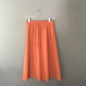 Athleta papaya orange hiking sport skirt size 4